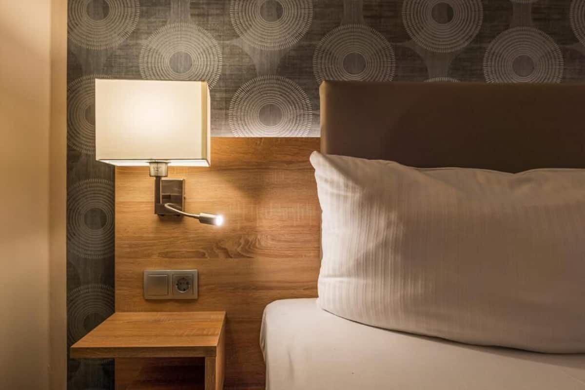 Hypo-allergenic bedding available, desk, laptop workspace, WiFi (free)