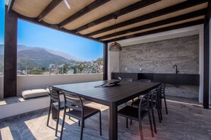 Rooftop dining table with amazing views - Modern Luxury 2BR in Romantic Zone (Puerto Vallarta)