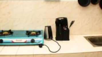 Fridge, microwave, electric kettle, toaster