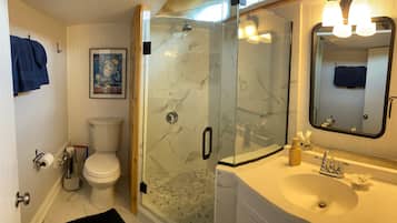 Shower, hair dryer, towels, soap