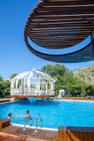 Seasonal outdoor pool, pool umbrellas, sun loungers