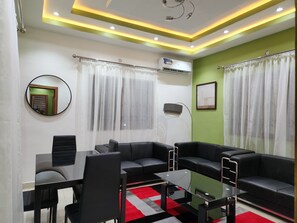 Standard Apartment | Living area | Flat-screen TV - The Morville Suites and Apartments (Abeokuta)