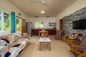 Standard Apartment, Garden View | Living area | 32-inch flat-screen TV with cable channels, TV - Top View retreat (Mahé Island)