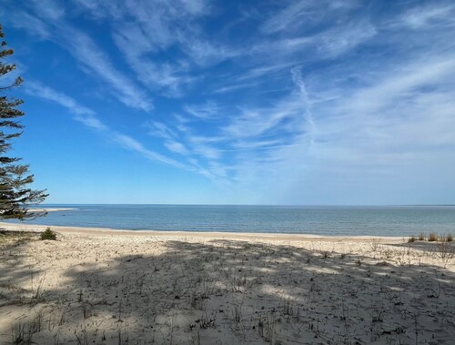 Island Getaway! Nestled in the woods with easy access to sandy beach