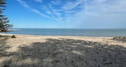 Island Getaway! Nestled in the woods with easy access to sandy beach