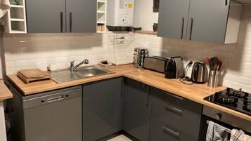 Microwave, oven, electric kettle, cookware/dishes/utensils