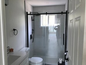 Shower, hair dryer, towels, soap