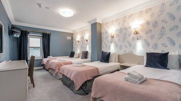 Standard Quadruple Room | Bathroom | Hair dryer, towels