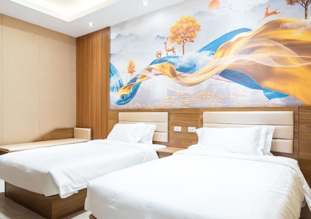 Premium bedding, desk, laptop workspace, soundproofing