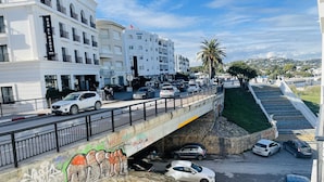 A multi-story building with a prominent sign for 'Dare Marsa Hotel'. - La Perle à Marsa Plage (La Marsa)