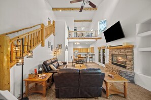 Smart TV, fireplace, books, video library