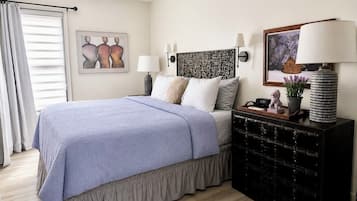 1 bedroom, desk, iron/ironing board, travel crib