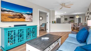 Luxury Apartment | Living area | 700-inch TV with cable channels