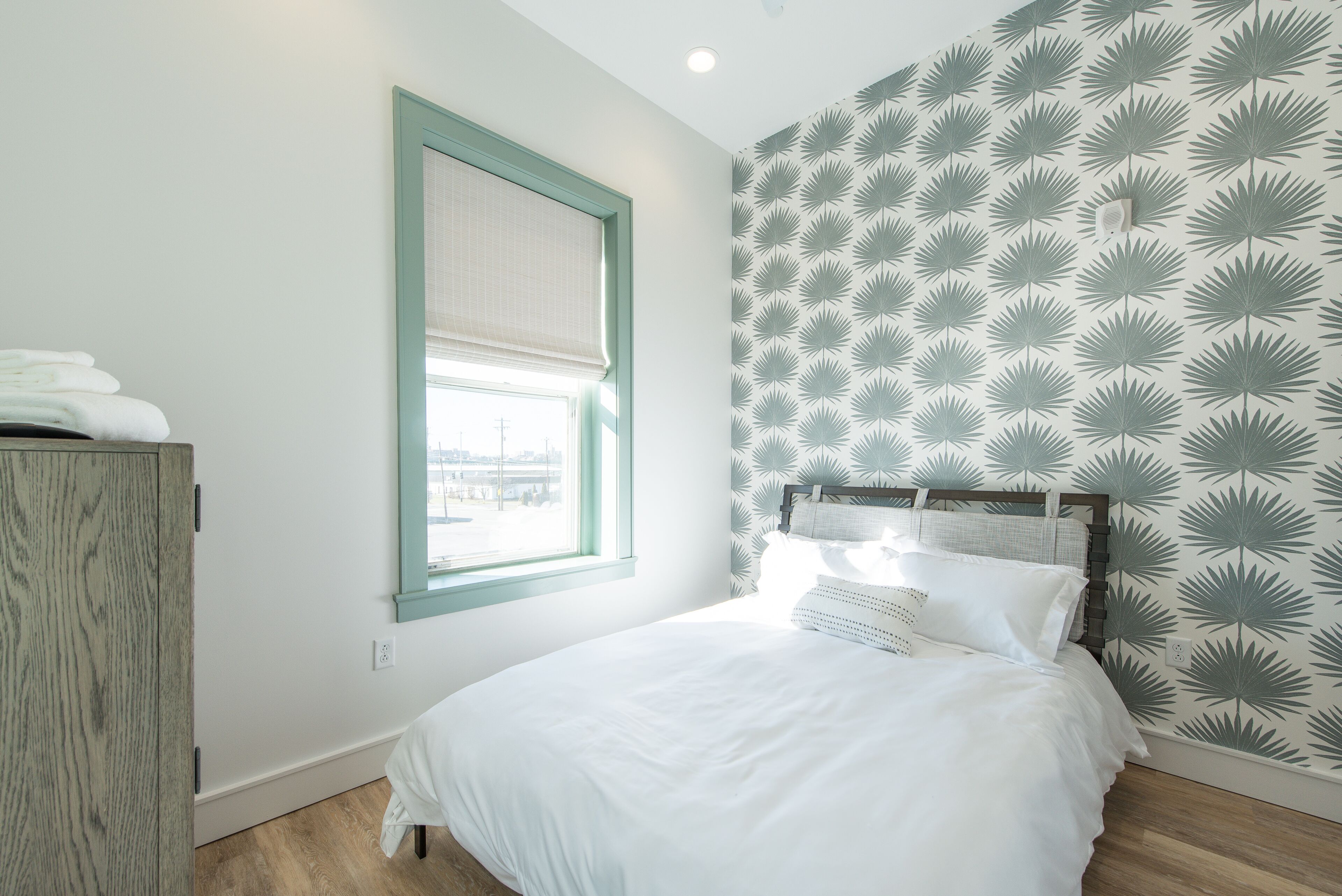 1 bedroom, desk, iron/ironing board, travel crib