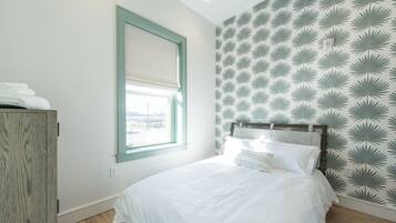 1 bedroom, desk, iron/ironing board, travel crib