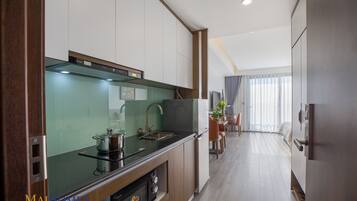 Down duvets, memory-foam beds, desk, laptop workspace