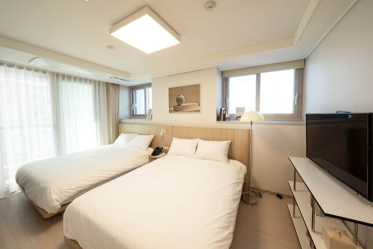 Premium bedding, individually furnished, blackout drapes, free WiFi