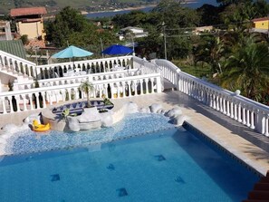 Outdoor pool, pool umbrellas, sun loungers