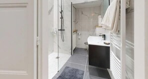 Hair dryer, towels, soap, toilet paper