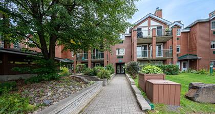 Chambre d'hotel le Cadillac 2 lits queen