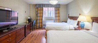 Chambre d'hotel le Cadillac 2 lits queen