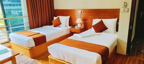 Habitación Deluxe doble | Ropa de cama de alta calidad y colchones Select Comfort