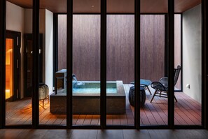 Separate bathtub and shower, hair dryer, bathrobes, slippers