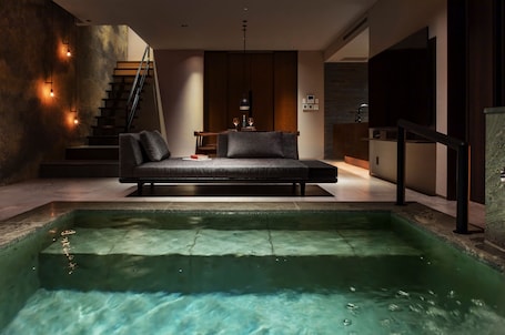 Separate tub and shower, hair dryer, bathrobes, slippers