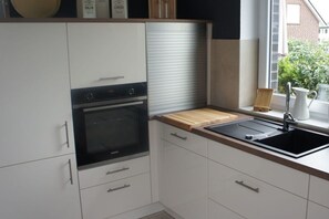 Réfrigérateur, four, plaque de cuisson, lave-vaisselle