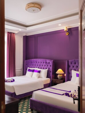 Habitación cuádruple superior | Ropa de cama de alta calidad y edredones de plumas
