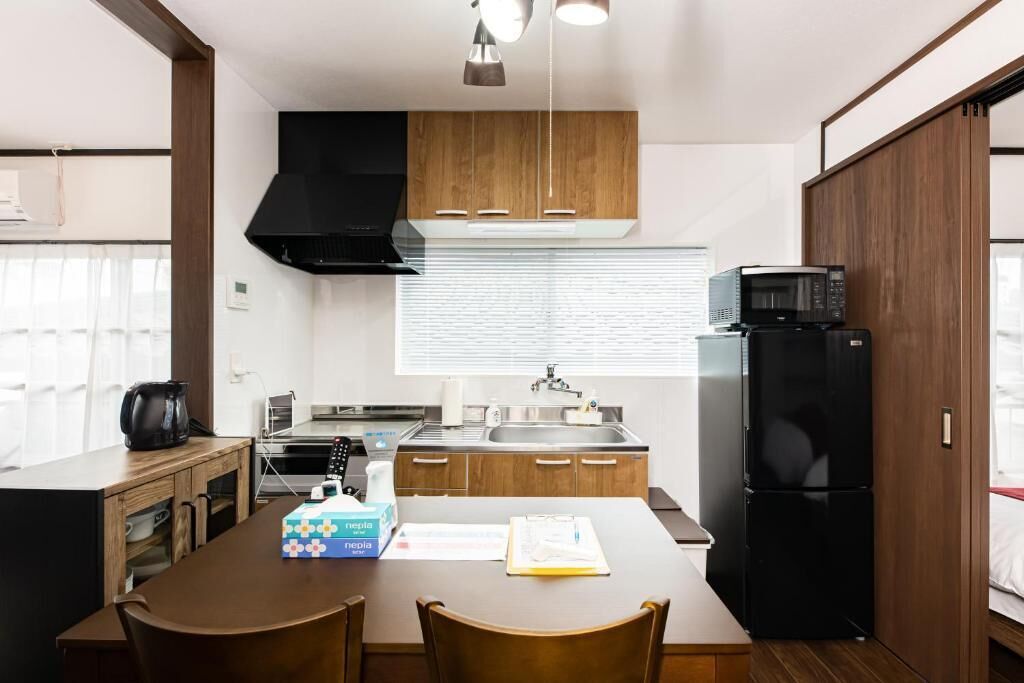 Apartment, Non Smoking | Private kitchen | Fridge, microwave, stovetop, cookware/dishes/utensils
