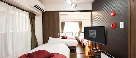 Apartamento, várias camas, para não fumantes | 1 quarto, Wi-Fi de cortesia, roupa de cama