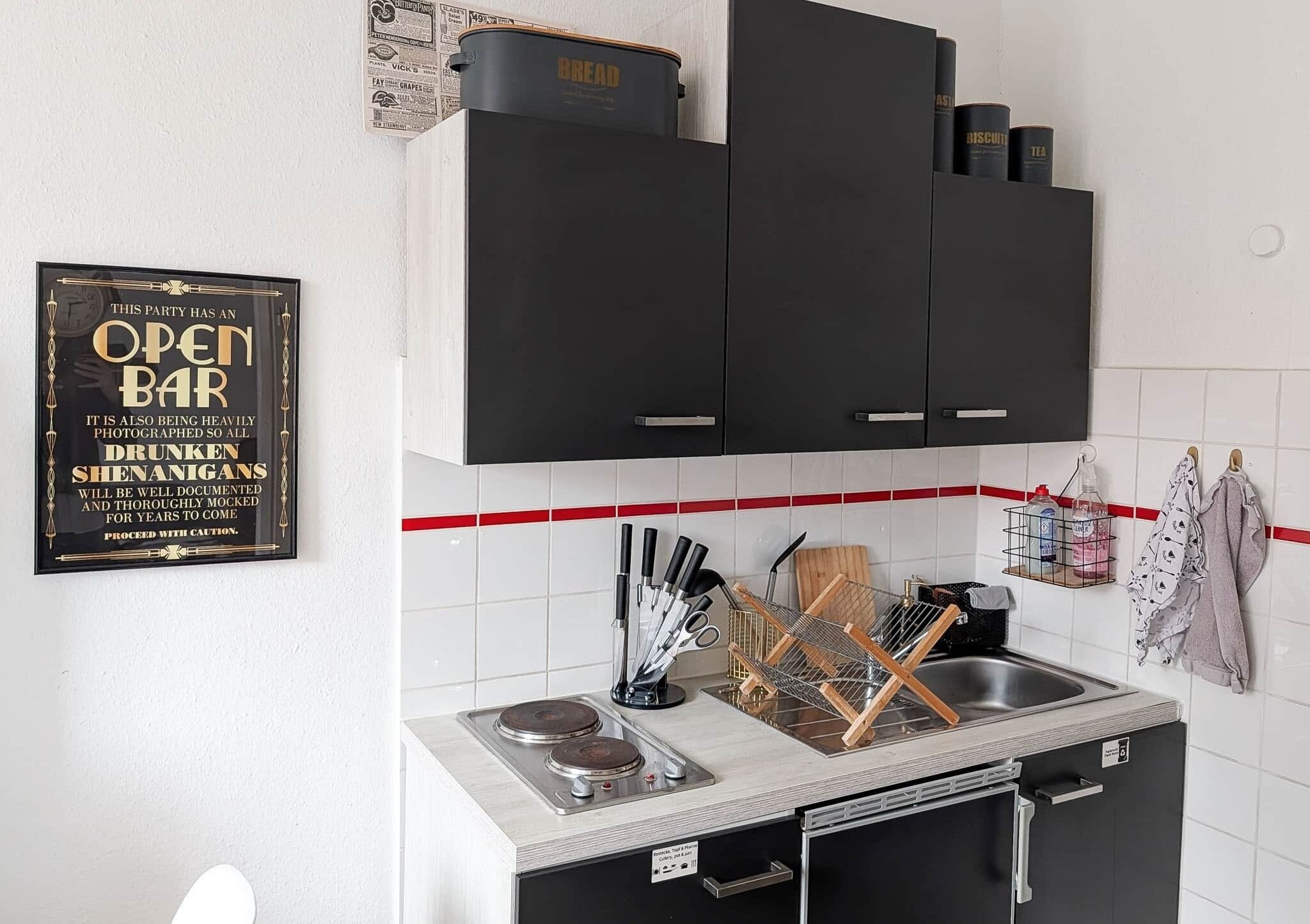 Fridge, microwave, stovetop, coffee/tea maker