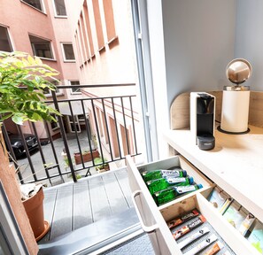 Comfort Room, Non Smoking, Balcony | Living area | 81-cm Smart TV with satellite channels, books