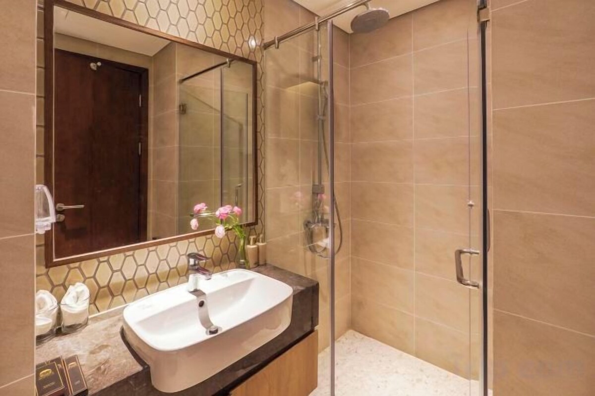 Shower, hydromassage showerhead, designer toiletries, hair dryer
