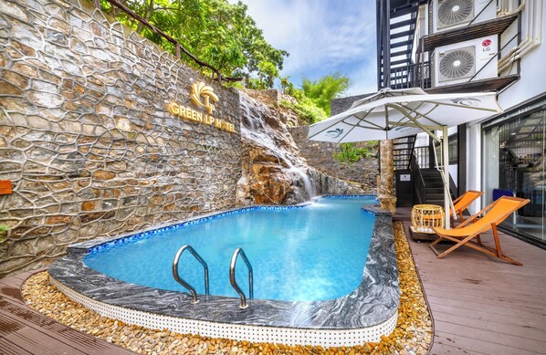 Outdoor pool, pool umbrellas, pool loungers