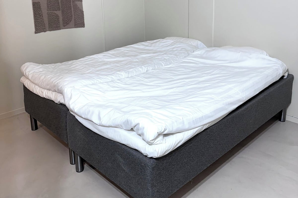 Smaller Twin Bed Room With a Bunk Bed. (No Windows)