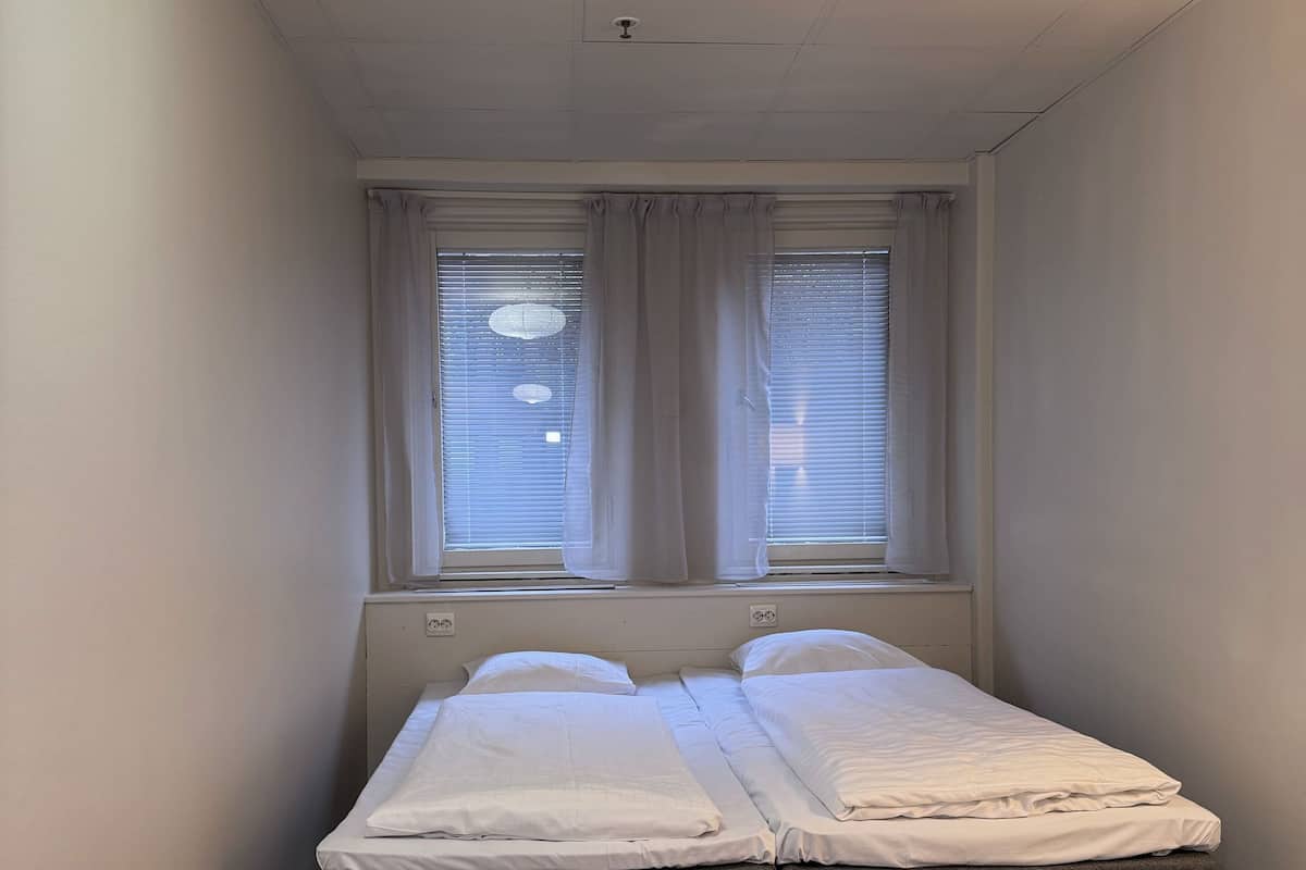 Private Twin Bed Room with a Sofa Bed