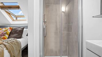 Shower, hair dryer, towels
