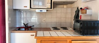Cozy 1BR Apartment Near Village, Ski Shuttles, and Scenic Balcony - Sleeps 4-6
