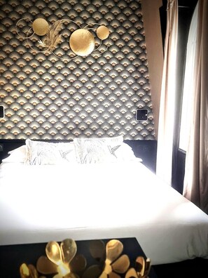 1 bedroom, desk, iron/ironing board, travel crib