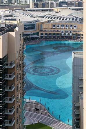 Experience the unique blend of architecture and water features at this high-rise hotel, offering stunning views of the surrounding area.