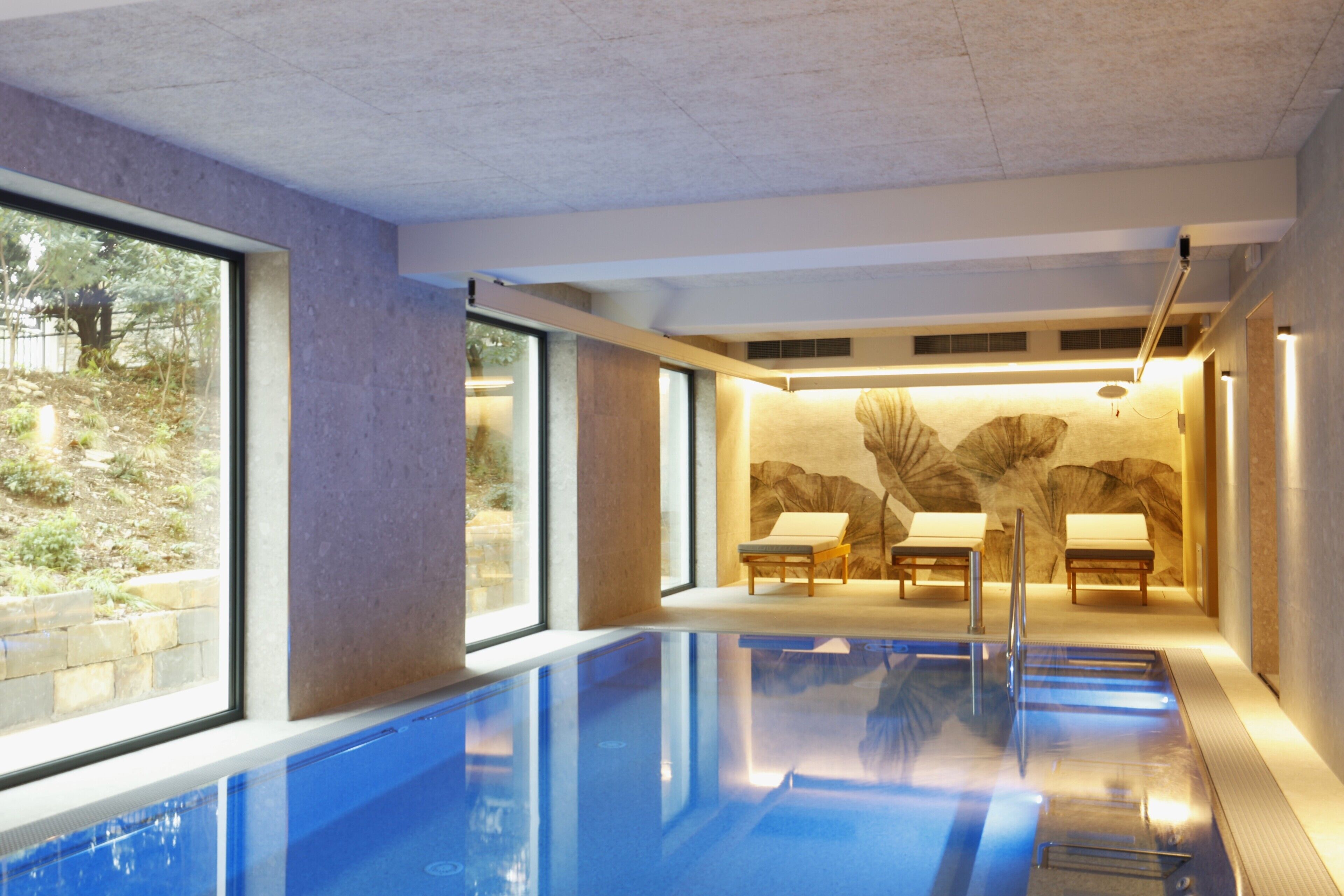 Indoor pool, 2 outdoor pools, open 8:00 AM to 8:00 PM, pool umbrellas