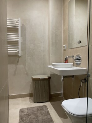 Hair dryer, towels, soap, shampoo