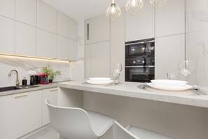 Apartment, 1 Bedroom, Balcony | Private kitchen | Microwave, dishwasher, coffee/tea maker, cookware/dishes/utensils - Apartment Łódź Fabryczna by Renters (Lodz)