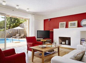 TV, fireplace - ISholidays Creta Pleiades Lux 2room Sea View&Pool (Agios Nikolaos)
