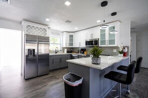 Fridge, microwave, oven, stovetop - Private Heated Saltwater Pool & SPA 3-Bdrm Home in Harbor Bluffs (Largo)