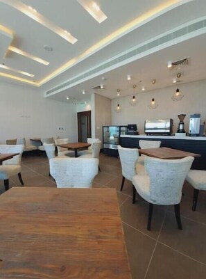 Dining - A Luxurious Sea View 1 Bedroom Apartment (Al HIDD)