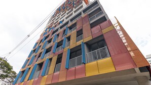 A multi-story building with a distinctive facade featuring a mix of geometric patterns and balconies. - Vossa Bossa Moema ON (São Paulo)