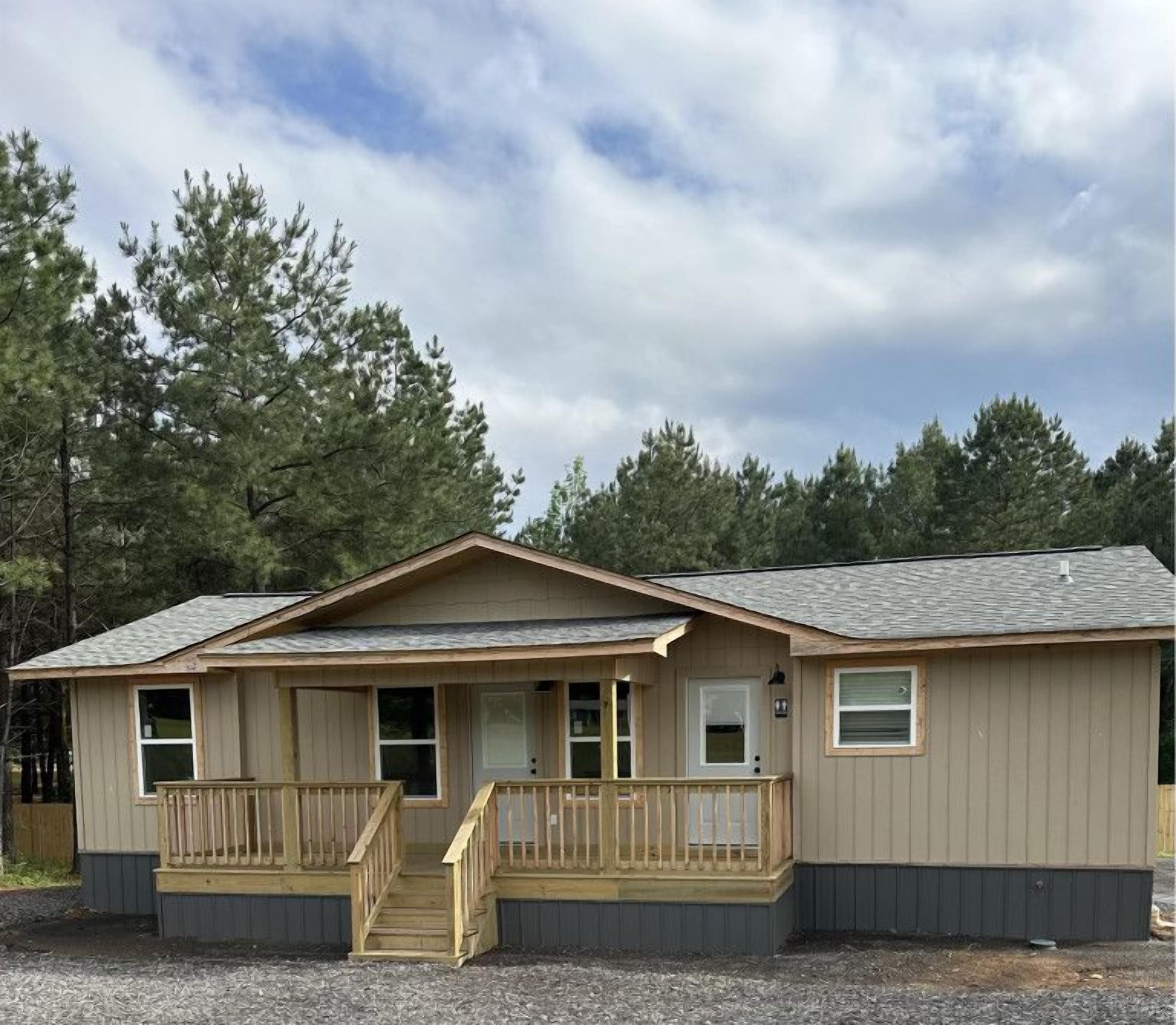 A clubhouse with two full bathrooms, washers and dryers for guests, and a lounge/game room in progress.